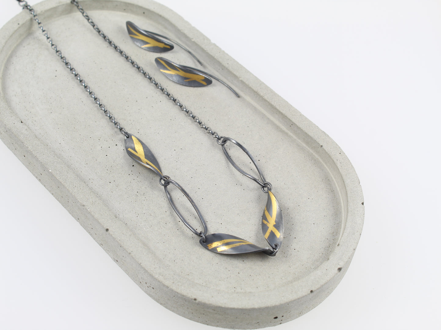Oxidised Twisted Olive Leaf necklace with gold detail