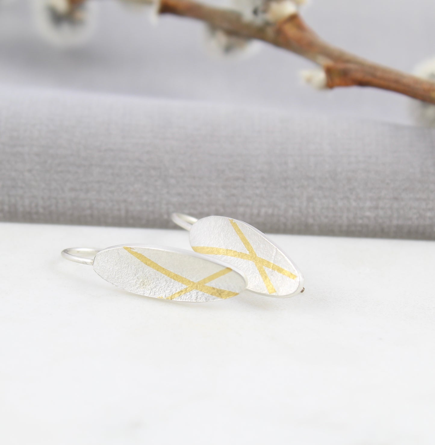 Olive drop earring with 24ct gold detail