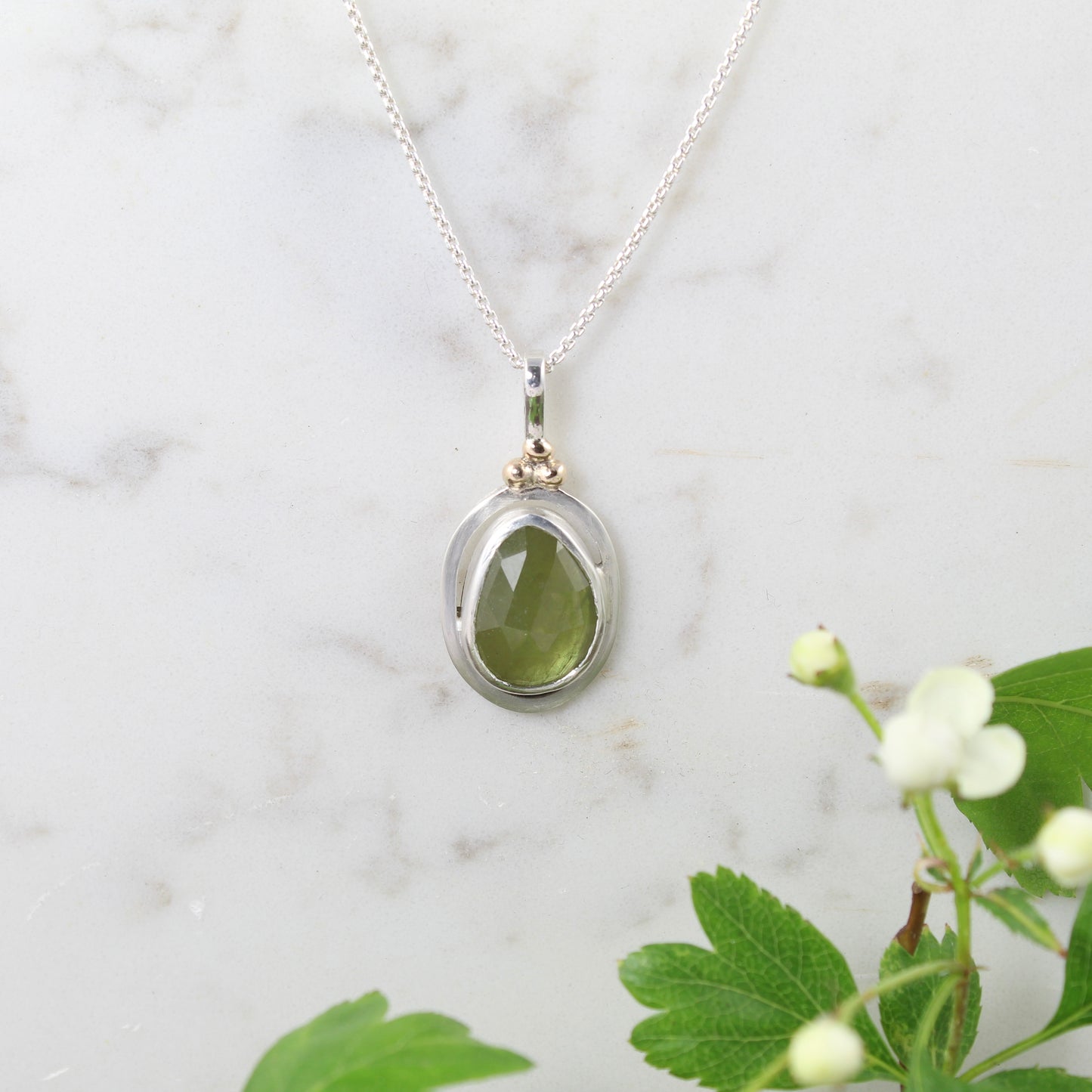 Framed Green Sapphire & Gold pendant