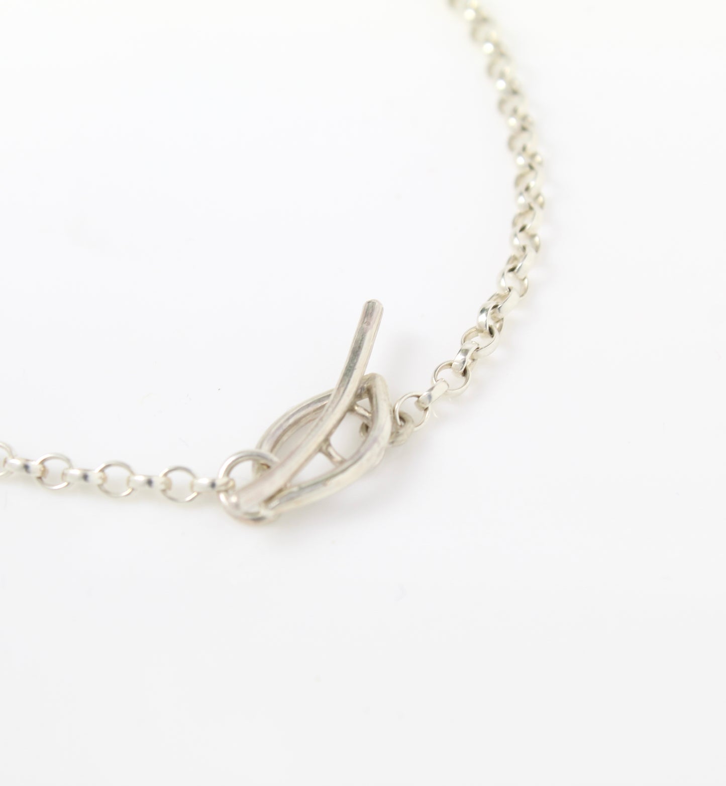 Curled leaf long silver necklace
