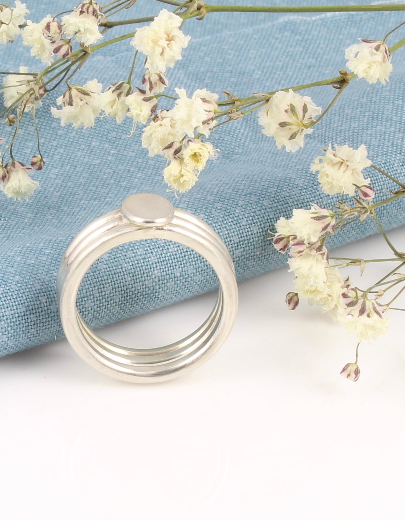 Wide silver blossom ring