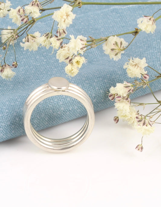 Wide silver blossom ring