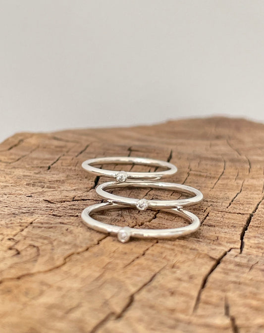 Silver and Moissanite rings