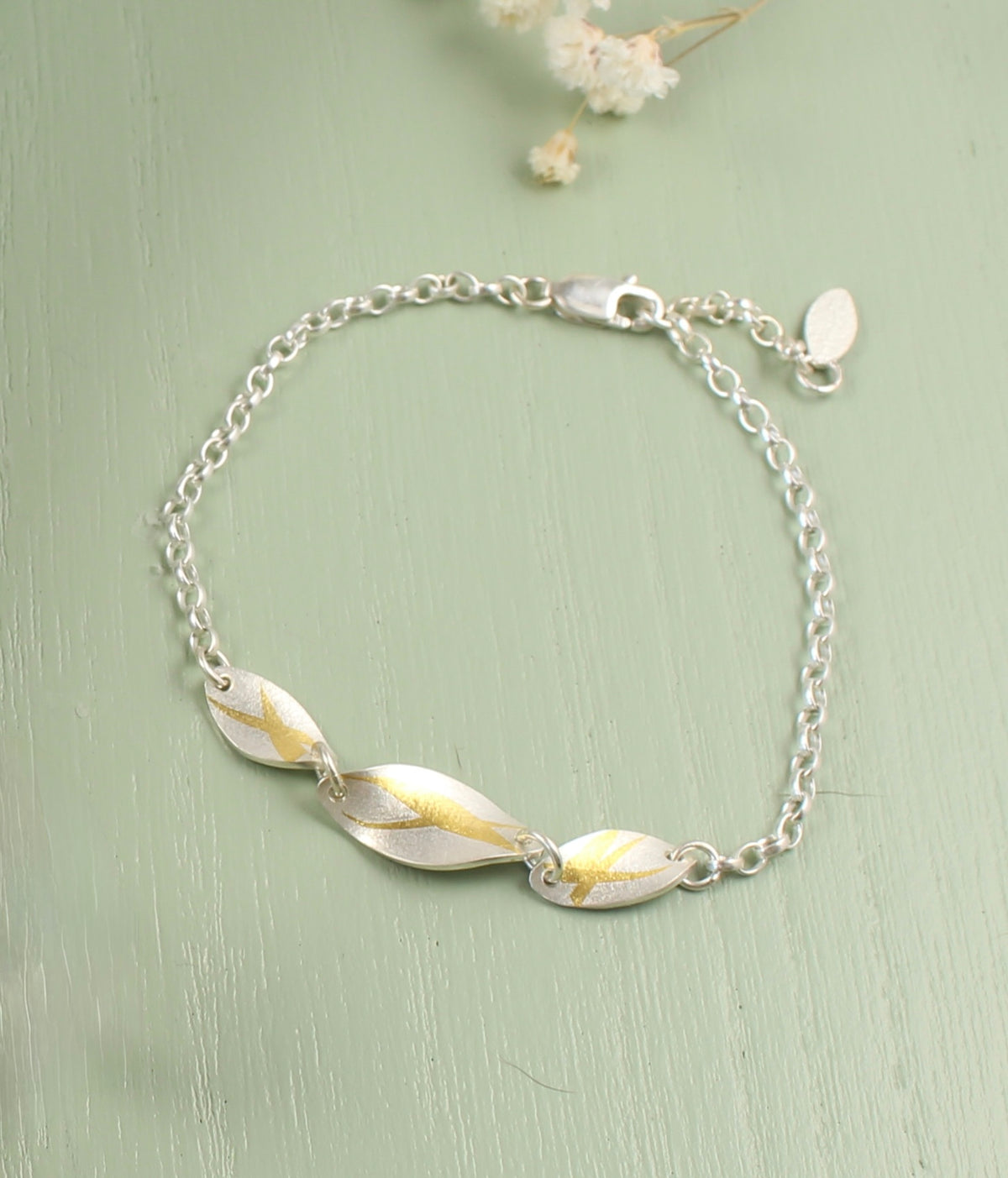 Silver and Gold Curved Bracelet