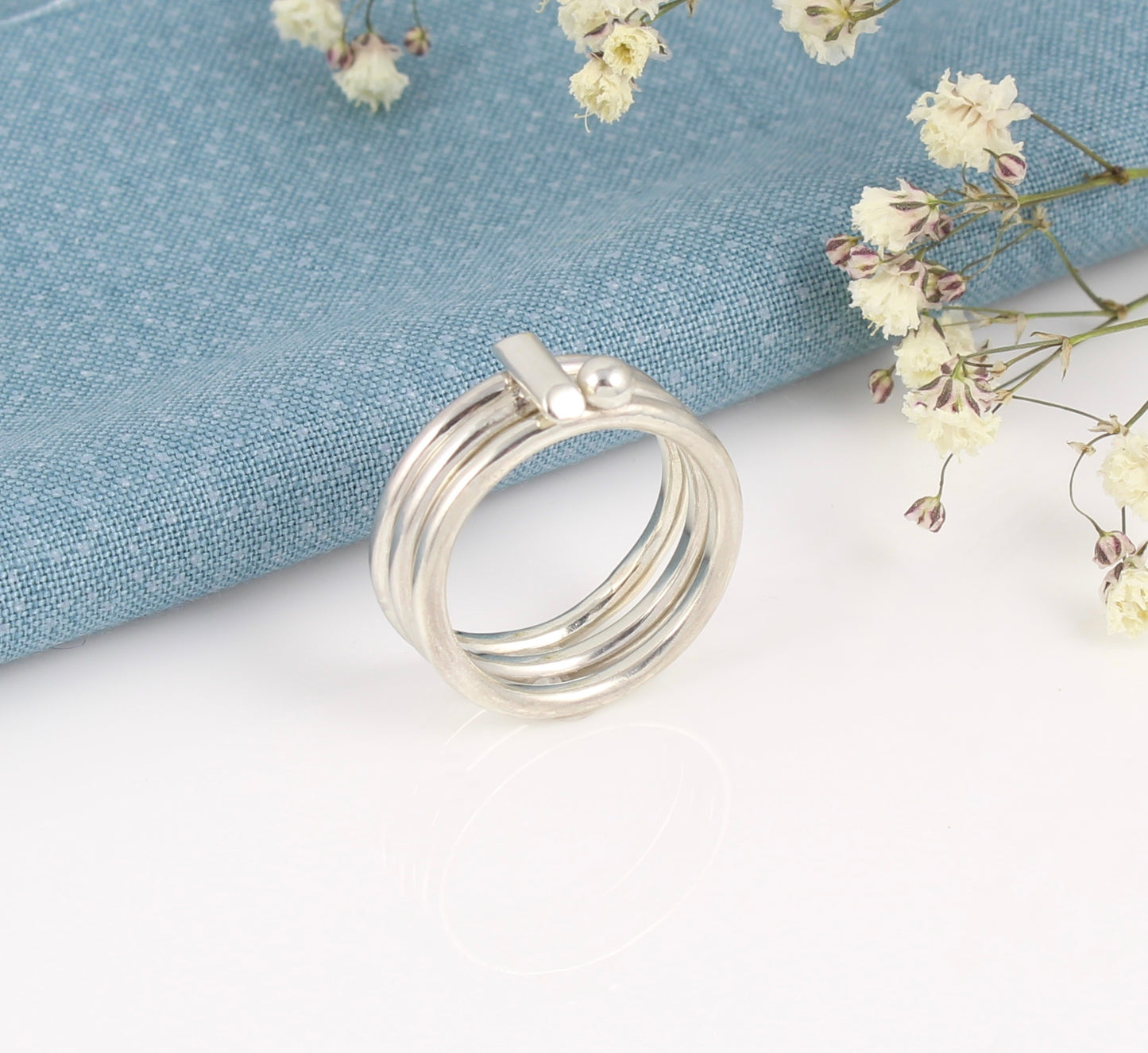 Contemporary Ball and Bar stacking rings